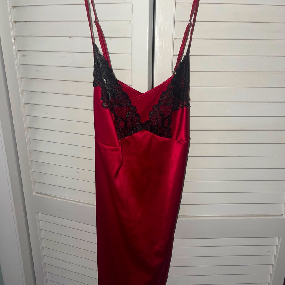 Silk red intimate dress with black lace and criss cross straps on back